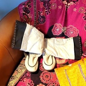 Soft tan & brown boots w. Brown stitching.